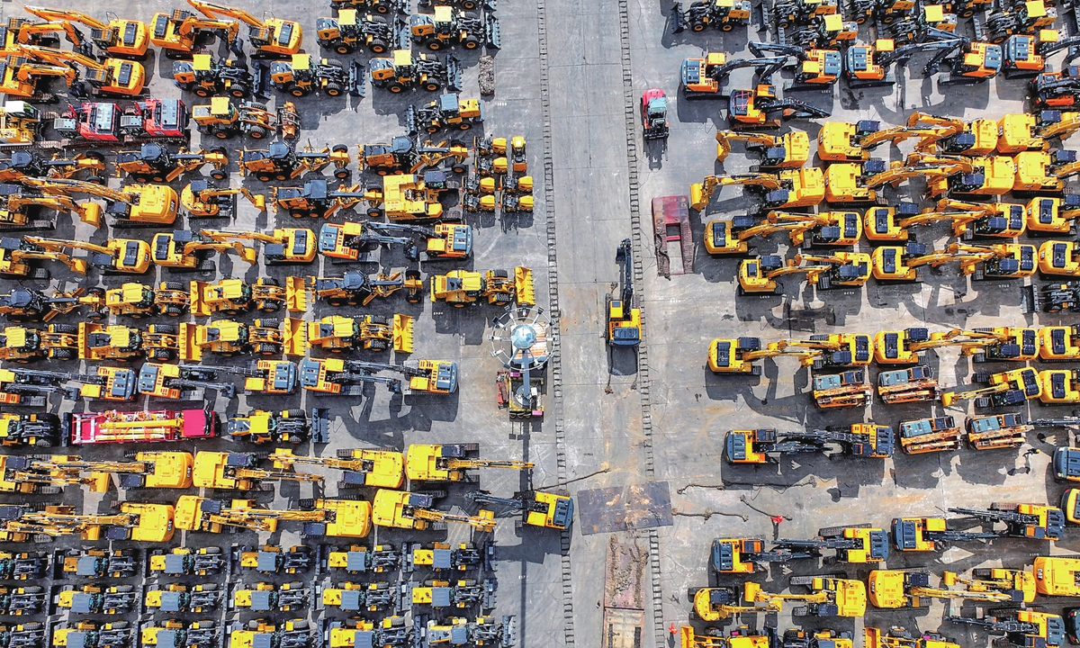 Excavators bound for overseas markets are parked at a terminal operated by Lianyungang Port Dongfang Port Branch in Lianyungang, East China's Jiangsu Province, on August 24, 2026. China's construction machinery exports reached $40.57 billion in the first seven months of 2026, up 21.2 percent year-on-year, industry data showed, reflecting steady progress in the sector's international expansion. Photo: VCG