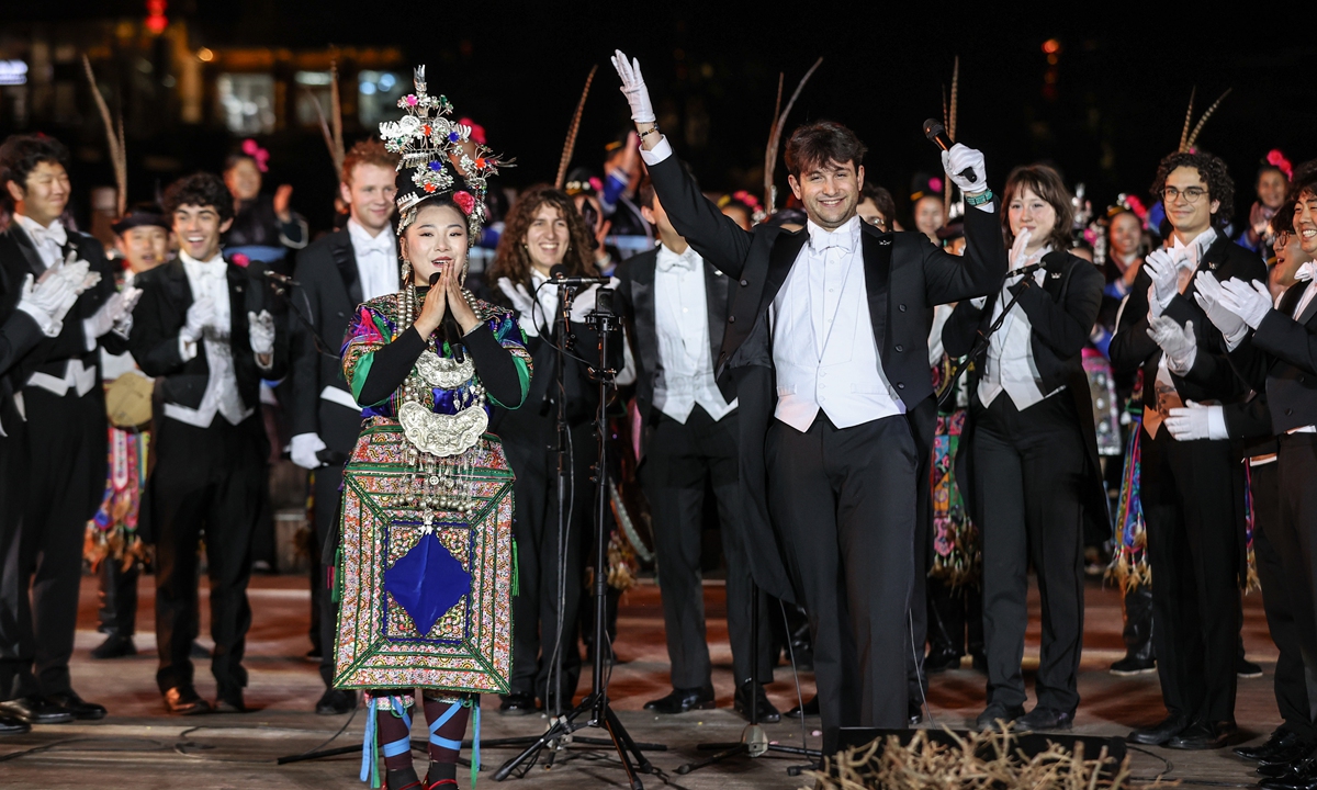 Members of the Yale Whiffenpoofs perform with local singers in Zhaoxing Dong Village, Southwest China's Guizhou Province, on March 23, 2026. Photo: IC