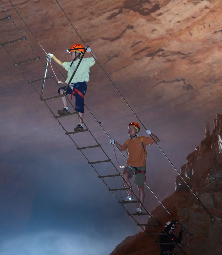 Visitors on a cave suspension bridge Photo: Courtesy of A Long