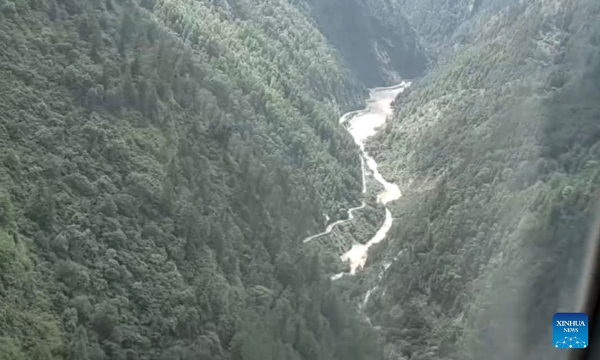 his screenshot from a video clip taken on Aug. 27, 2026 shows a military helicopter hovering over the mudslide-hit Gyirong Port in Gyirong County, southwest China's Xizang Autonomous Region. Photo: Xinhua