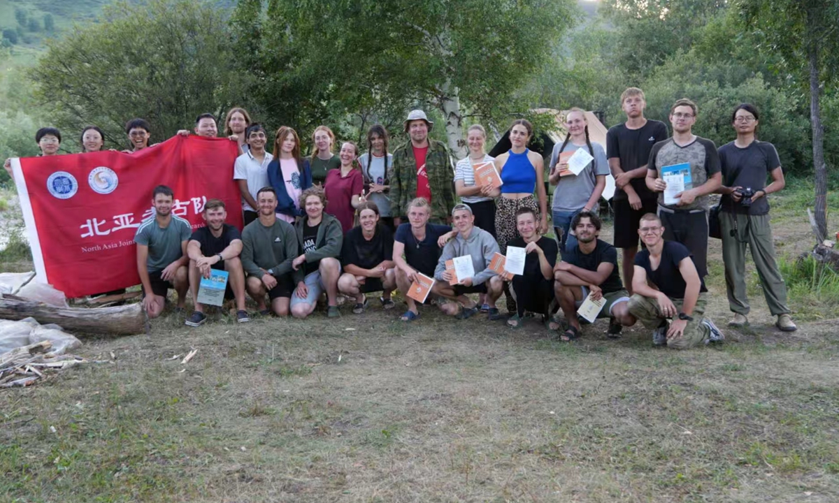 The joint China-Russia archaeological excavation team take a group photo at the Chileta tomb complex, Altai, Russia, on July 17, 2026. Photo: Courtesy of Mu Jinshan