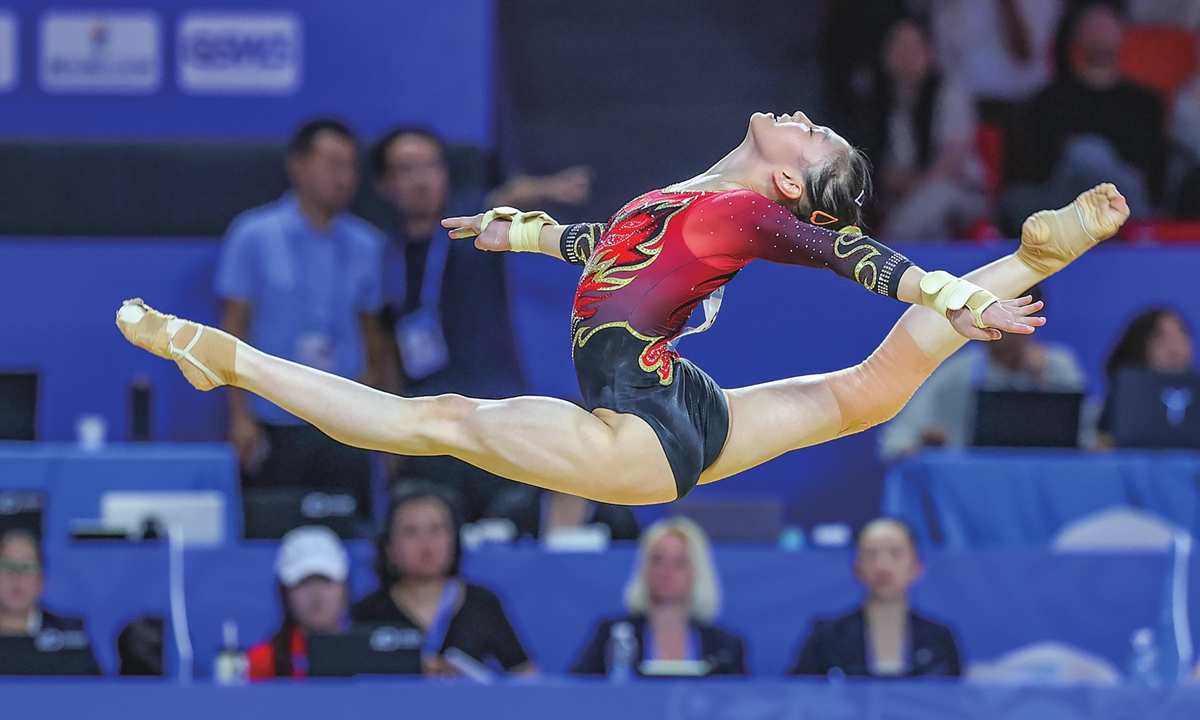 Ke Qinqin competes in the floor exercise of Asian Gymnastics Championships on June 25, 2025. 
Wang Yudong plays in the friendly game between China and Thailand in Jinhua of East China's Zhejiang Province on June 9, 2026.
Yu Zidi competes in the women's 400m individual medley final during  the China Open Swimming Championship in Shenzhen on March 21, 2026. Photos on this page: VCG
