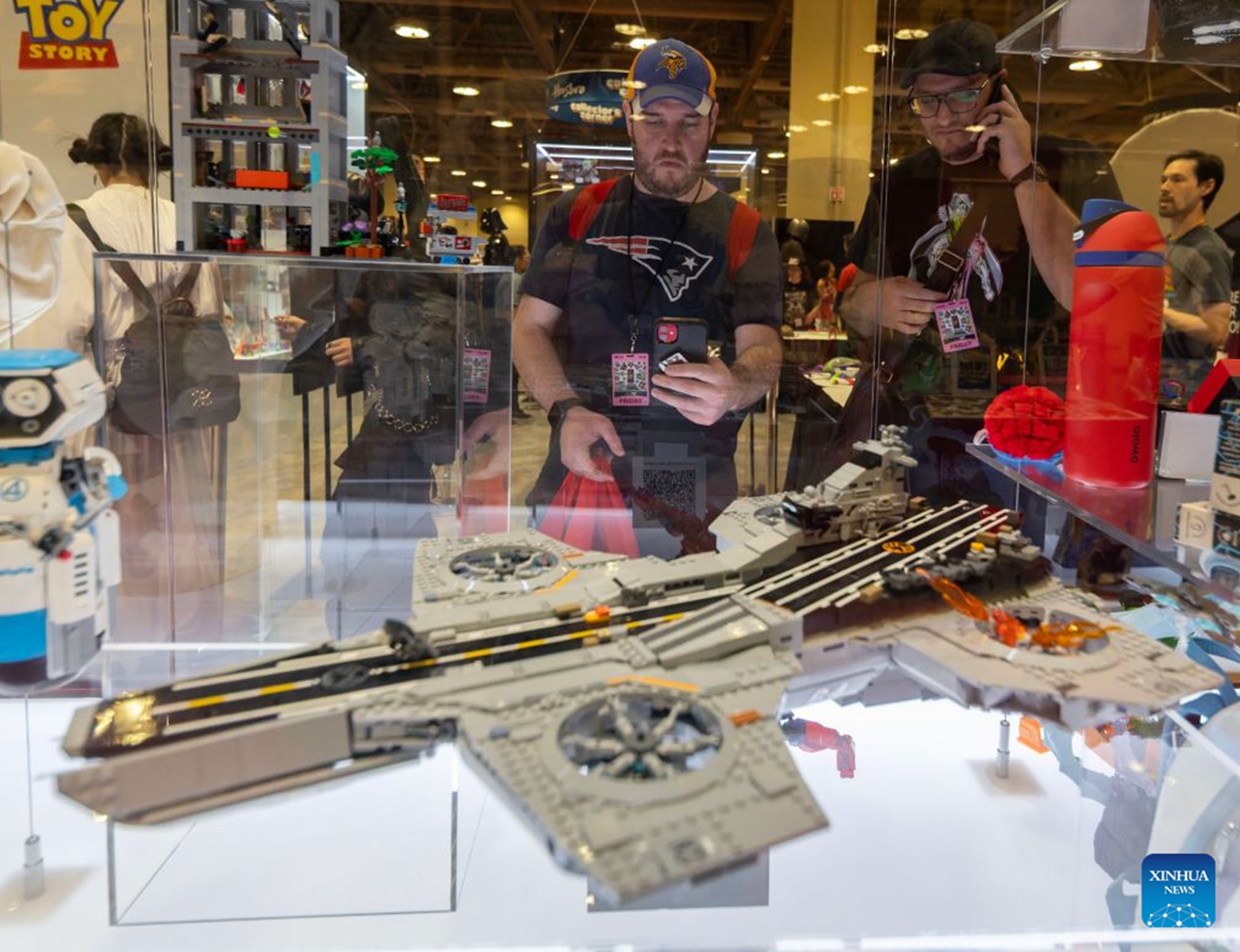 People view LEGO creations on display at the 2026 Fan Expo Canada in Toronto, Canada, on Aug. 28, 2026. As a major comics, sci-fi, anime and gaming event in Canada, this annual convention runs from Aug. 27 to 30, drawing thousands of fans from around the world. (Photo by Zou Zheng/Xinhua)
