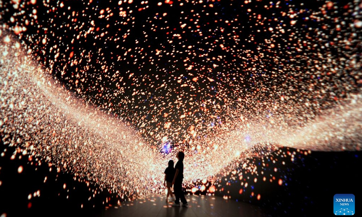 People visit an immersive digital exhibition in Surabaya, East Java Province, Indonesia, Aug. 27, 2026. (Photo by Sahlan Kurniawan/Xinhua)