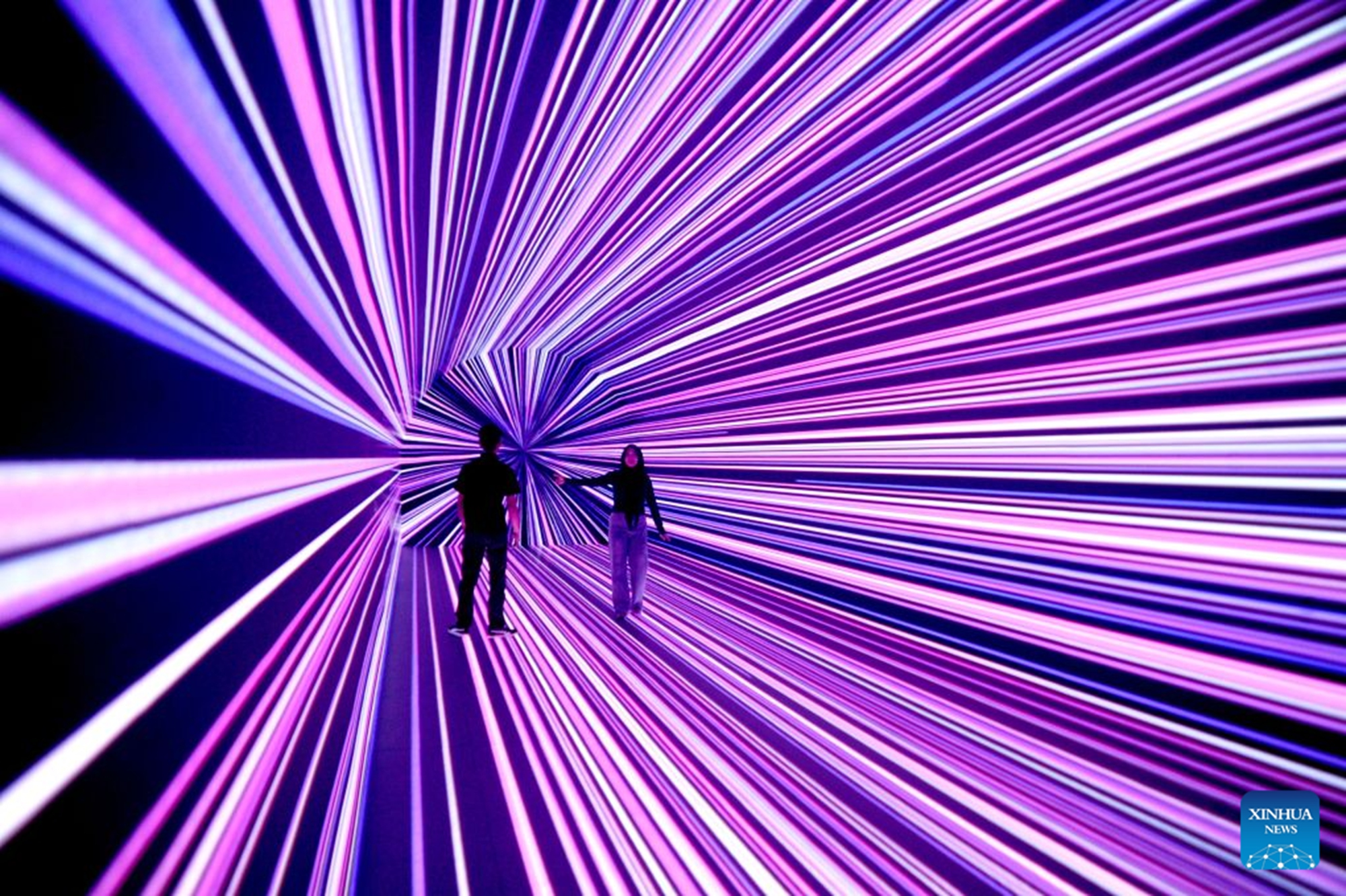 People visit an immersive digital exhibition in Surabaya, East Java Province, Indonesia, Aug. 27, 2026. (Photo by Sahlan Kurniawan/Xinhua)