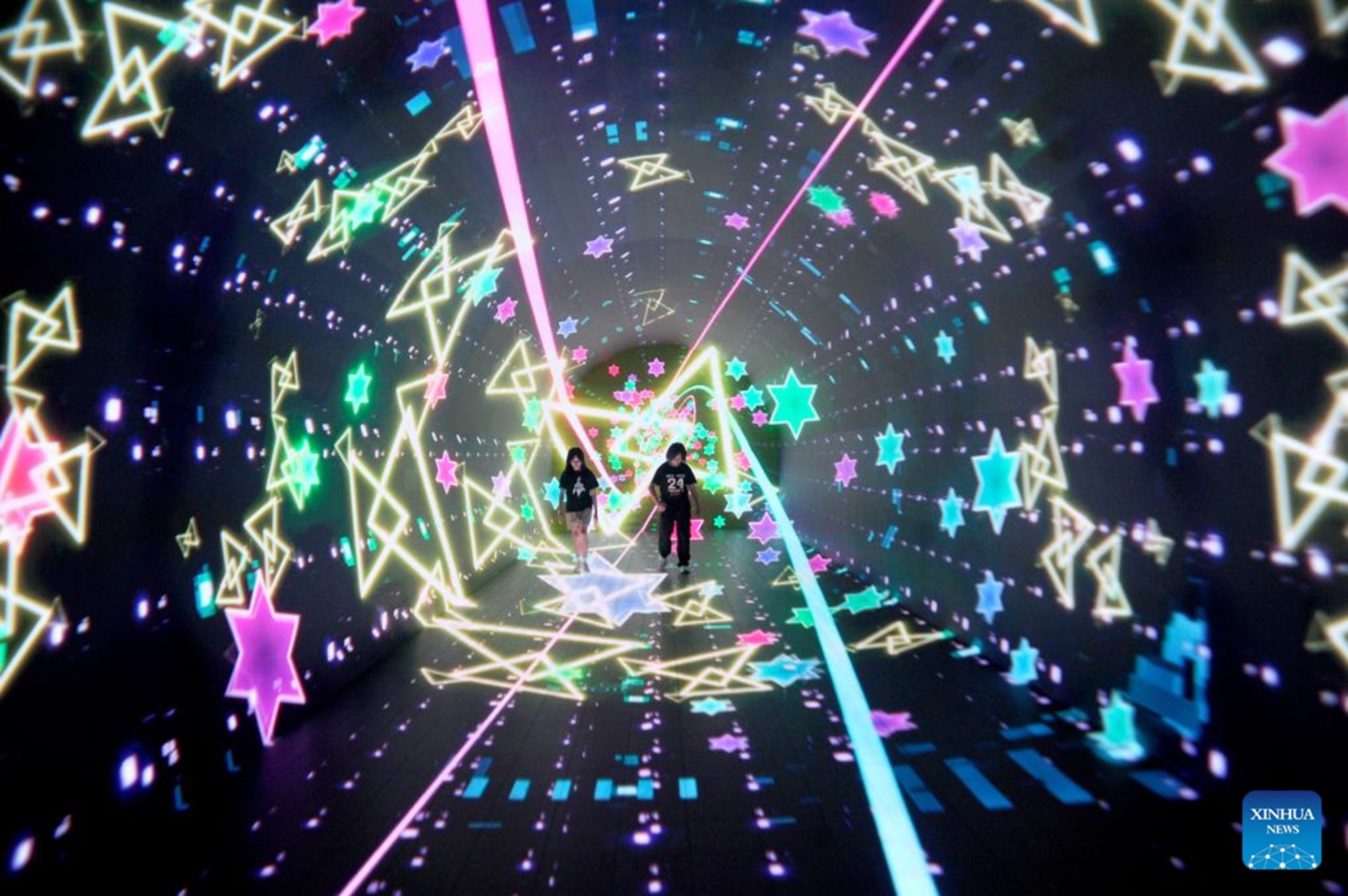 People visit an immersive digital exhibition in Surabaya, East Java Province, Indonesia, Aug. 27, 2026. (Photo by Sahlan Kurniawan/Xinhua)