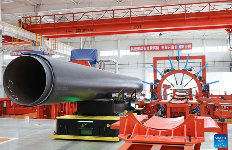 An automated guided vehicle operates at a workshop in north China's Tianjin Municipality, Aug. 28, 2026. In recent years, Beichen District in Tianjin has leveraged technological innovation to upgrade its industries, developing 60 smart factories across sectors including light manufacturing, new materials and high-end equipment. Photo: Xinhua