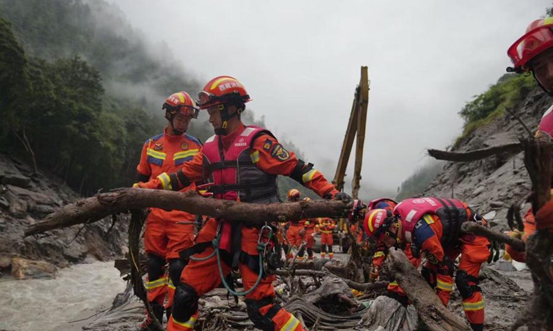 This photo shows rescuers working at the mudslide-hit area in Gyirong County, southwest China's Xizang Autonomous Region, Aug. 29, 2026. (Xinhua/Tenzing Nima Qadhup)