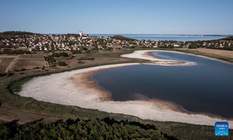 This aerial drone photo taken on Aug. 29, 2026 shows a view of the Inner Lake of Tihany in Tihany, Hungary. The Inner Lake of Tihany, located on Hungary's Tihany Peninsula, is a scenic volcanic crater lake. (Photo by David Balogh/Xinhua)