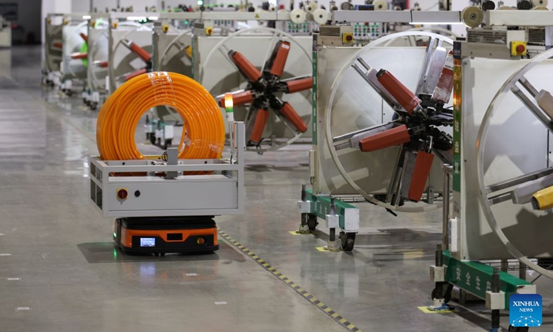 An automated guided vehicle operates at a workshop of a building materials company in north China's Tianjin Municipality, Aug. 28, 2026. In recent years, Beichen District in Tianjin has leveraged technological innovation to upgrade its industries, developing 60 smart factories across sectors including light manufacturing, new materials and high-end equipment. Photo: Xinhua