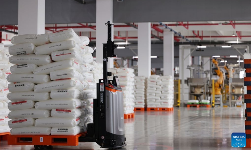 An automated guided vehicle operates at a workshop of a building materials company in north China's Tianjin Municipality, Aug. 28, 2026. In recent years, Beichen District in Tianjin has leveraged technological innovation to upgrade its industries, developing 60 smart factories across sectors including light manufacturing, new materials and high-end equipment. Photo: Xinhua