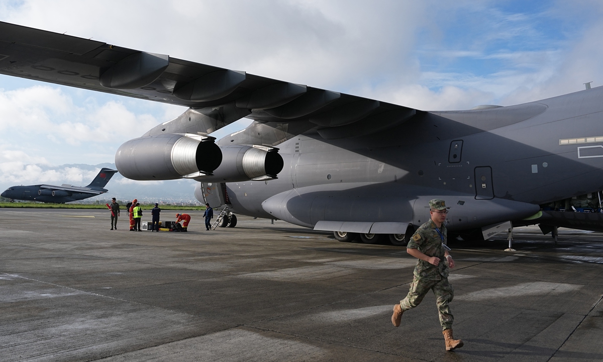 Two Y-20 transport aircraft of the Chinese People's Liberation Army (PLA) Air Force carrying 50 tons of emergency relief supplies totaling 13,200 items arrive in Nepal on August 30, 2026. Photo: CNS Photo