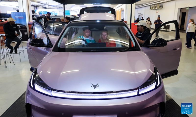 Visitors sit in a car at the booth of Chinese automaker BAIC during the Festival of Motoring in Johannesburg, South Africa, Aug. 28, 2026.
The 9th edition of the Festival of Motoring kicked off on Friday at Kyalami Grand Prix Circuit in Johannesburg. Chinese automakers showcase their latest models at the event. Photo: Xinhua