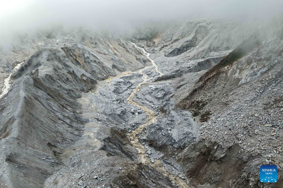 An aerial drone photo taken on Sept. 5, 2026 shows the site which used to be a barrier lake above the core area of the mudslide-hit Gyirong Port in southwest China's Xizang Autonomous Region. Currently, the barrier lake has been drained, the river channel has returned to normal flow, and the associated hazard has been largely eliminated, according to the region's emergency management department. (Photo: Xinhua)