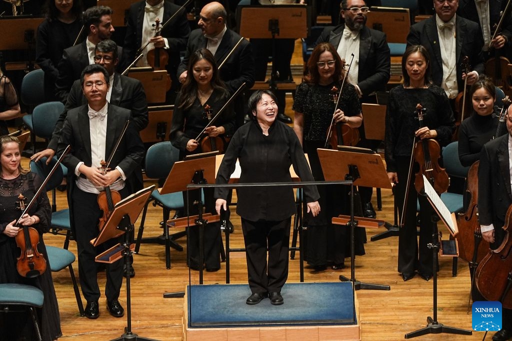 Conductor Zhang Xian (C) greets the audience after a concert at the Sala Sao Paulo in Sao Paulo, Brazil, Sept. 3, 2026. Jointly presented by the China National Centre for the Performing Arts (NCPA) Orchestra and the Sao Paulo Symphony Orchestra, the concert showcased the cultural charm of China and Brazil through a dialogue of music. (Photo: Xinhua)