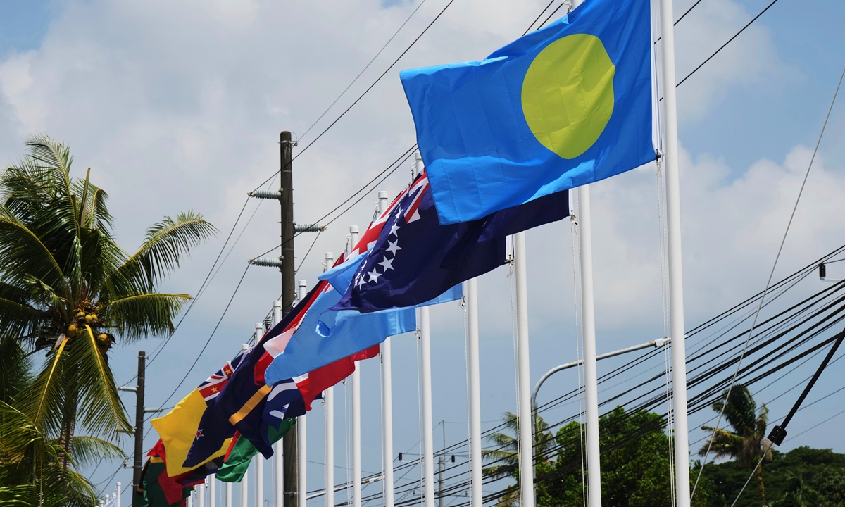Flags of member states fly outside the summit venue for the Pacific Islands Forum Leaders Meeting in Koror, Palau, on August 30, 2026. Photo: VCG