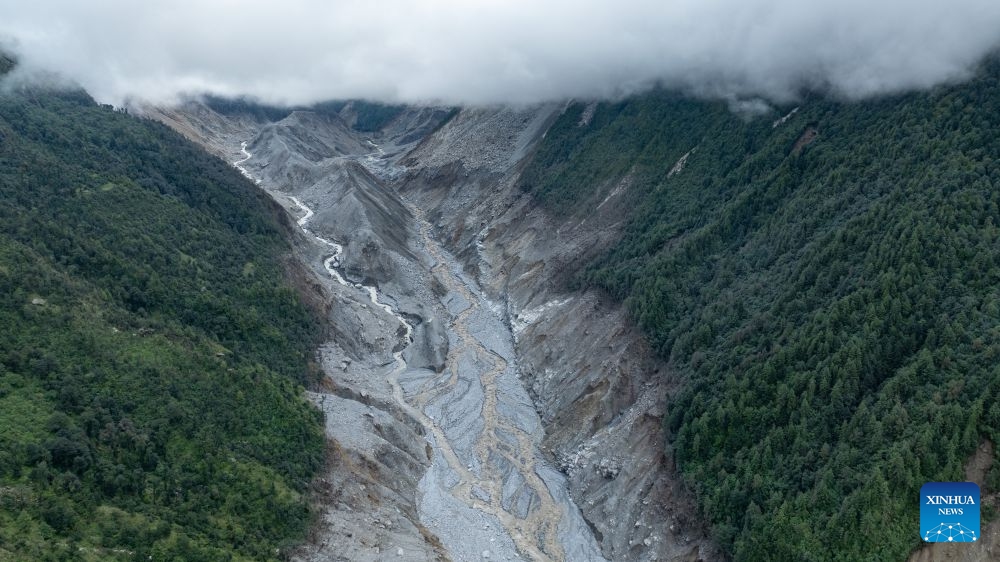 An aerial drone photo taken on Sept. 5, 2026 shows the site which used to be a barrier lake above the core area of the mudslide-hit Gyirong Port in southwest China's Xizang Autonomous Region. Currently, the barrier lake has been drained, the river channel has returned to normal flow, and the associated hazard has been largely eliminated, according to the region's emergency management department. (Photo: Xinhua)
