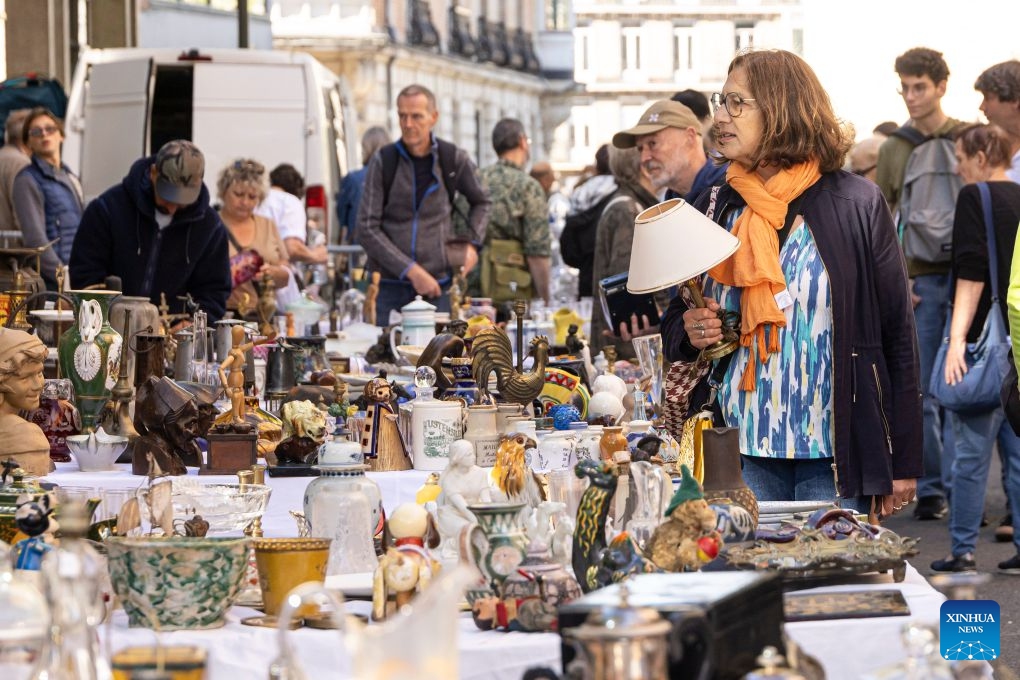 People look at items during the Lille Braderie 2026 in Lille, north France, Sept. 5, 2026. The annual Lille Braderie, one of Europe's largest flea markets, kicked off on Saturday. (Photo: Xinhua)
