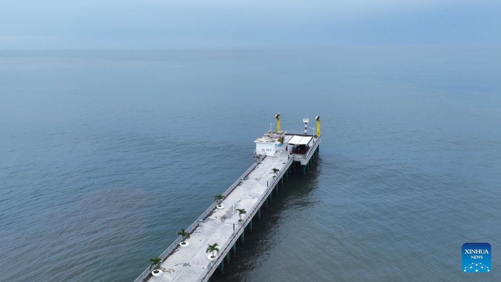 An aerial drone photo taken on Sept. 3, 2026 shows a view of the La Libertad Pier in El Salvador. The China-aided La Libertad Pier was put into operation in 2024. It has become a popular seaside attraction in La Libertad, featuring sightseeing and rest areas, dining and commercial facilities, and electric boat lifts. (Photo: Xinhua)