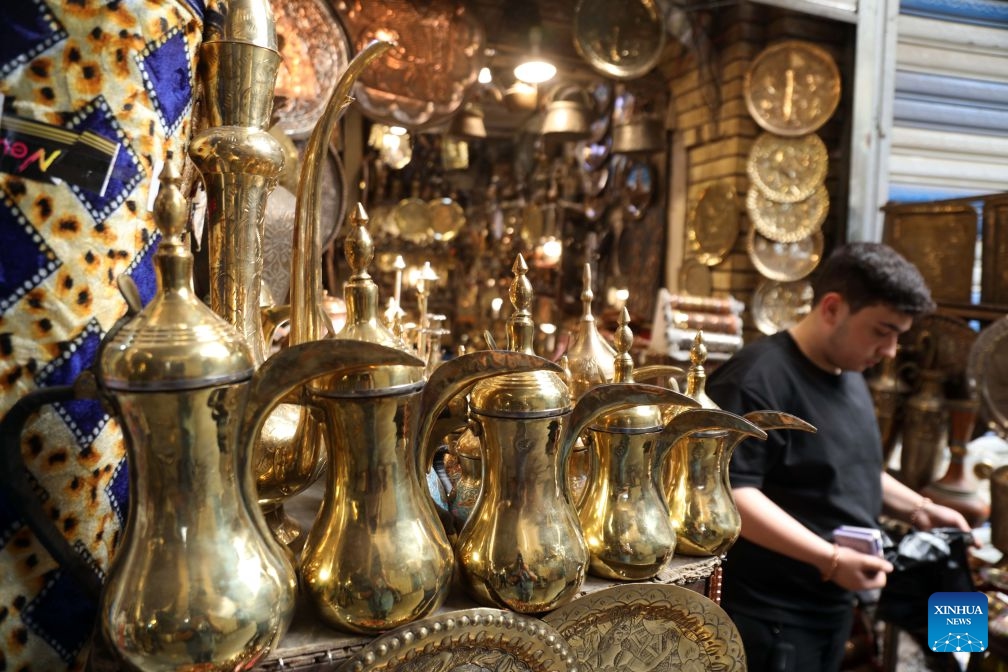 Copper items are displayed at Souk al-Safafeer, a traditional copper market, in Baghdad, Iraq, on Sept. 5, 2026. (Photo: Xinhua)