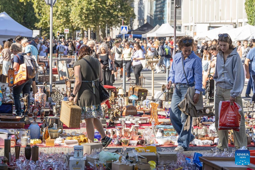 People look at items during the Lille Braderie 2026 in Lille, north France, Sept. 5, 2026. The annual Lille Braderie, one of Europe's largest flea markets, kicked off on Saturday. (Photo: Xinhua)