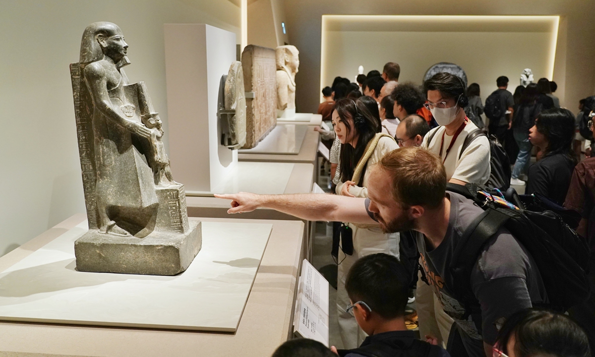 Visitors view artifacts at the Ancient Egypt Unveiled: Treasures from Egyptian Museums special exhibition at the Hong Kong Palace Museum in Hong Kong on August 31, 2026, the closing day of the exhibition. Photo: VCG