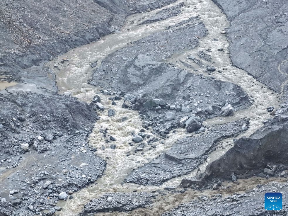 An aerial drone photo taken on Sept. 5, 2026 shows the site which used to be a barrier lake above the core area of the mudslide-hit Gyirong Port in southwest China's Xizang Autonomous Region. Currently, the barrier lake has been drained, the river channel has returned to normal flow, and the associated hazard has been largely eliminated, according to the region's emergency management department. (Photo: Xinhua)