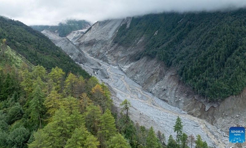 An aerial drone photo taken on Sept. 5, 2026 shows the site which used to be a barrier lake above the core area of the mudslide-hit Gyirong Port in southwest China's Xizang Autonomous Region. Currently, the barrier lake has been drained, the river channel has returned to normal flow, and the associated hazard has been largely eliminated, according to the region's emergency management department. (Photo: Xinhua)