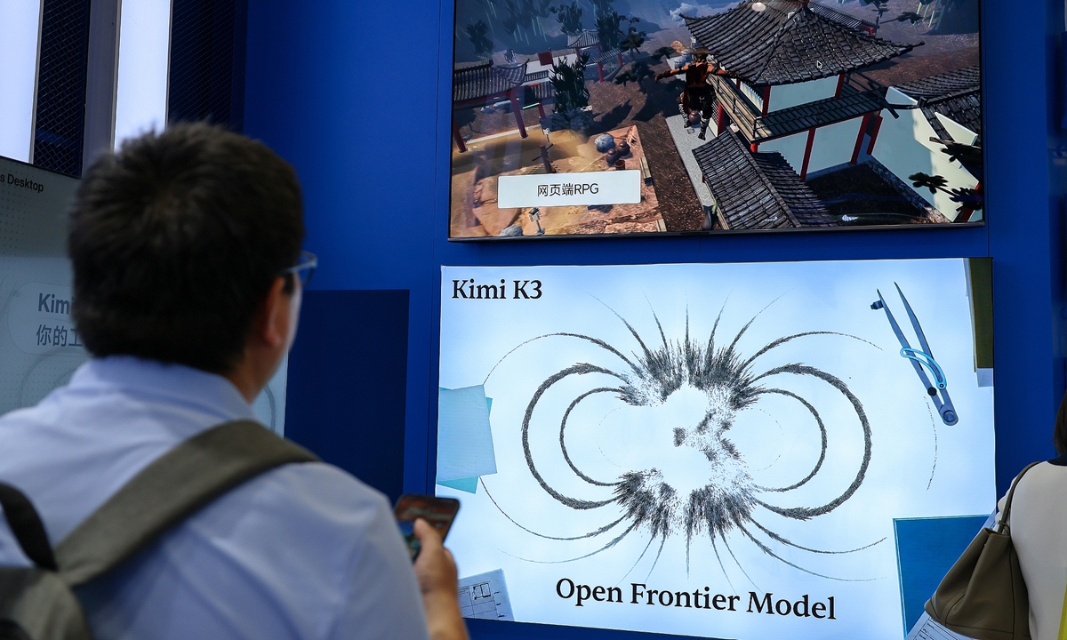 A visitor stands in front of the Kimi booth at the World Artificial Intelligence Conference in Shanghai on July 20, 2026. Photos: VCG

