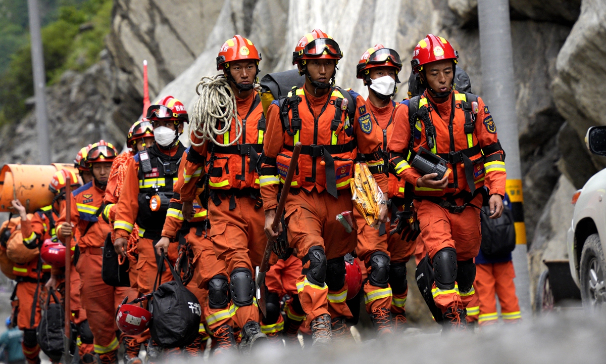 Rescuers carry supplies and equipment into the core disaster area on September 2, 2026. Road access to the core area of the mudslide-hit Gyirong Port in Southwest China's Xizang Autonomous Region was basically restored at 10 am on the day. Photo: VCG