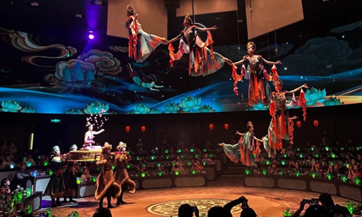 Performers present a graceful flying dance at a Chinese imperial-style banquet in Shanghai as part of the restaurant's immersive dining experience. Photo: Courtesy of YANYUE restaurant