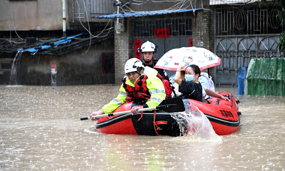 Rescuers evacuate stranded residents in Fuzhou, East China's Fujian Province, on September 3, 2026, after heavy rainfall brought by Typhoon Saudel. Photo: VCG