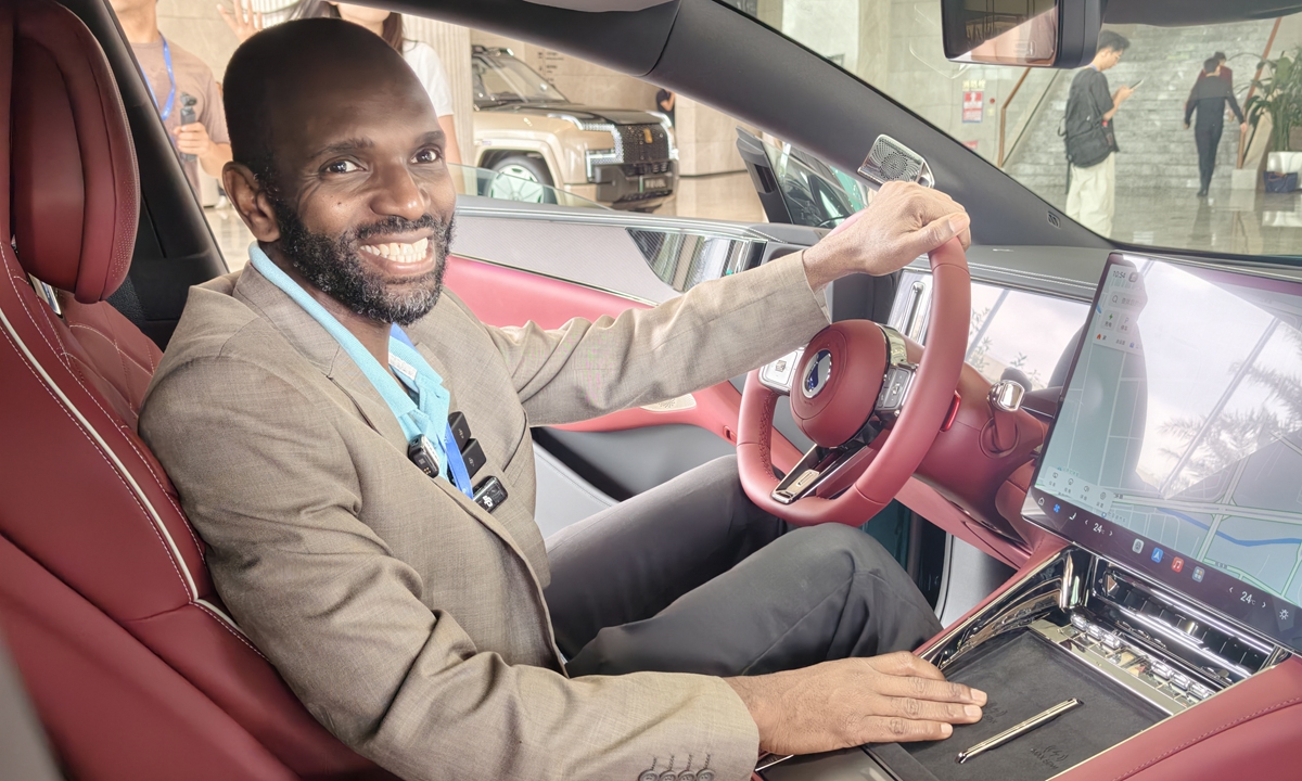 A Canadian delegate tries a BYD electric vehicle at the headquarters of the company in Shenzhen on September 5, 2026. Photo: Hu Yuwei/GT