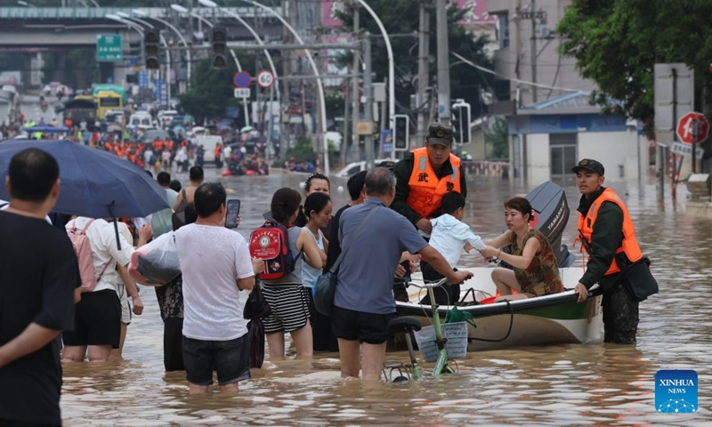 Rescuers evacuate stranded people at the Hualin economic development zone in Putian City, southeast China's Fujian Province, Sept. 4, 2026. Continuous torrential rains led to severe waterlogging at the Hualin economic development zone in Putian. The local authorities immediately organized rescue forces to evacuate over 3,000 stranded workers in the zone to safe areas. (Xinhua/Jiang Kehong)