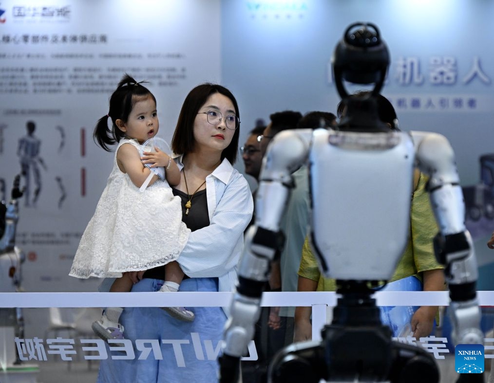 People visit the embodied intelligence exhibition area at the 2026 China International Consumer Electronics Exposition (CICE) in Qingdao, east China's Shandong Province, Sept. 4, 2026.