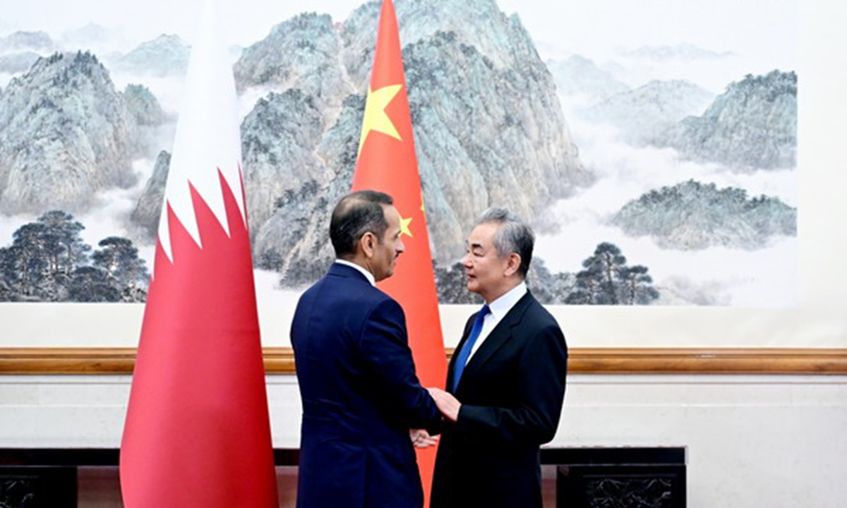 Chinese Foreign Minister Wang Yi (right) meets Qatari Prime Minister and Minister of Foreign Affairs Sheikh Mohammed bin Abdulrahman Al Thani in Beijing on Tuesday. Photo: Chinese Foreign Ministry