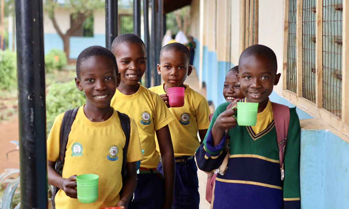 Students at  Juhudi Primary School, Tanzania enjoy soy milk in June 2026. Photo: Courtesy of Zhang Yao