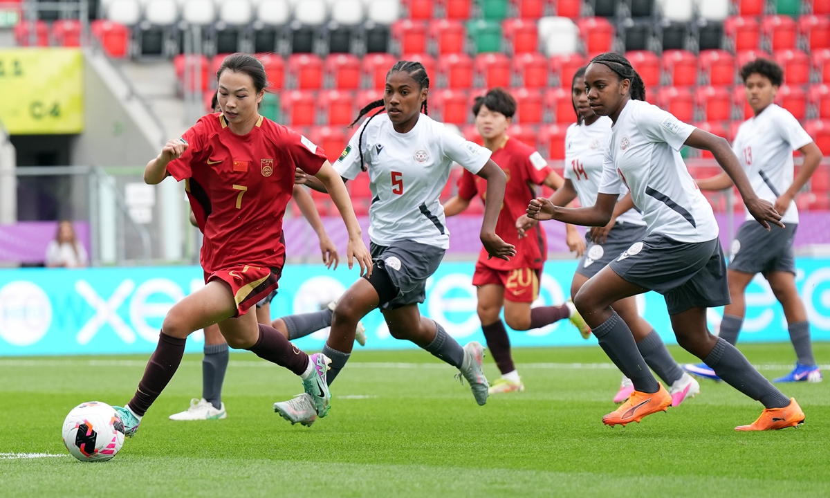 Ouyang Yuhuan (left) of China runs with the ball during the FIFA U-20 Women's World Cup Group F match against New Caledonia in Sosnowiec, Poland, on September 7, 2026. The Chinese team has been drawn into Group F alongside Spain, Nigeria and New Caledonia in the tournament, which is taking place in Poland from September 5 to 27, with the final scheduled for September 27 in Lodz. Photo: VCG