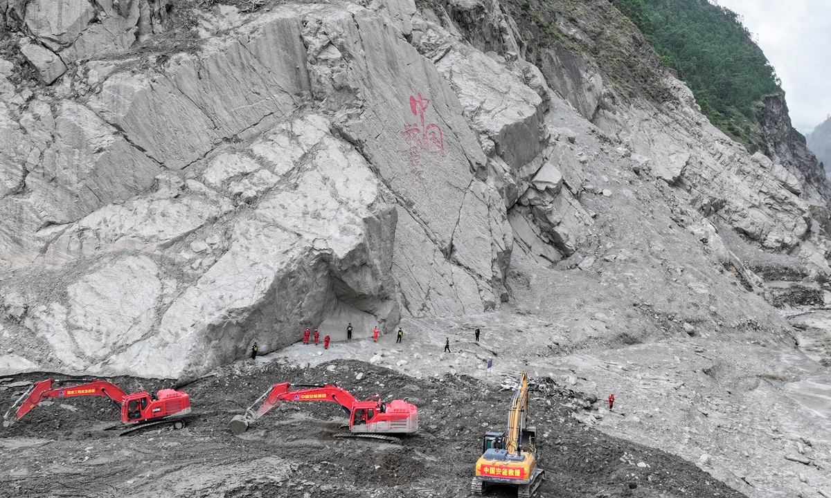 Eleven days have passed since the mudslide disaster hit Gyirong, Southwest China's Xizang Autonomous Region, on August 26, with rescue and relief efforts continuing. The photo shows excavators, loaders and other heavy equipment operating in the core disaster-hit area of Gyirong Port. Photo: VCG