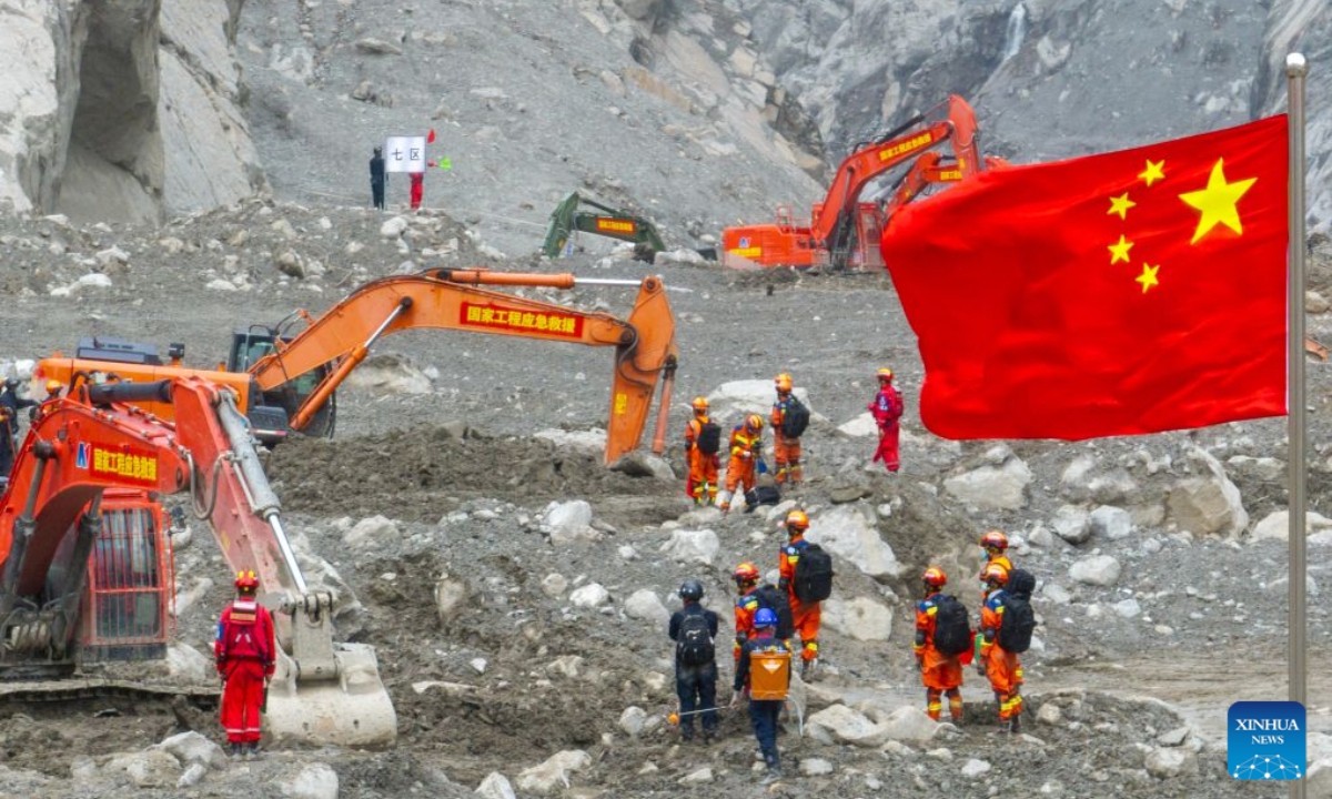 A drone photo taken on Sept. 6, 2026 shows rescuers working at the core affected zone of the mudslide-hit Gyirong Port in southwest China's Xizang Autonomous Region. (Xinhua/Tenzin Nyida)