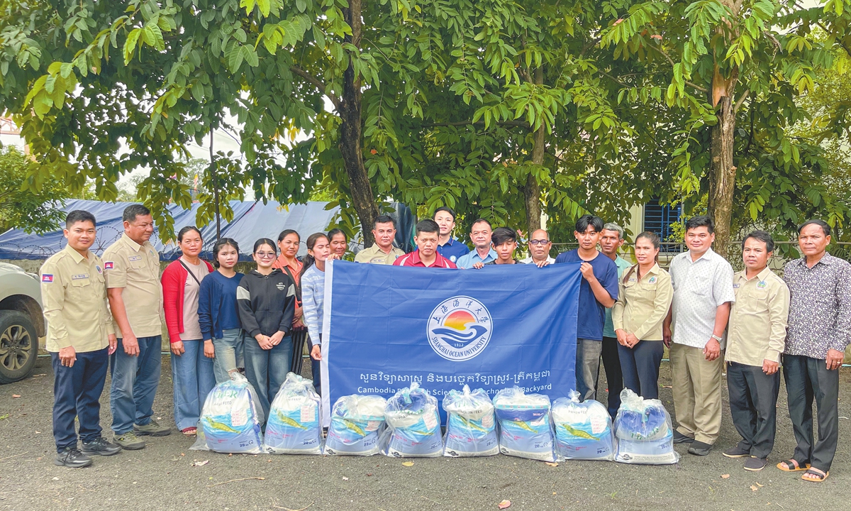 Members of the rice-shrimp farming project send shrimp fry and feed to farmers in Cambodia's Kampong Thom province on August 15, 2026. Photo: Courtesy of Zhang Dongdong