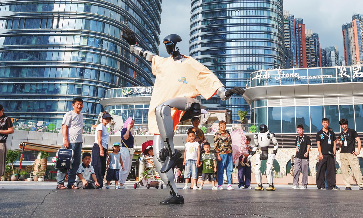 Visitors view a robotic dance show in Shenzhen, South China's Guangdong Province on September 4, 2026. Photo: VCG