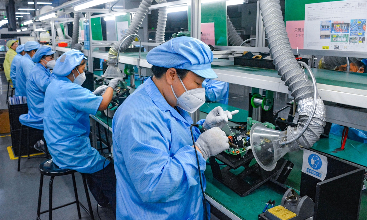 Workers churn out electronic products at a company in the Yuexi Economic Development Zone of Anqing City, east China's Anhui Province, on September 9, 2026. In recent years, Yuexi County has continuously optimized its business environment and actively responded to market demand, helping enterprises expand domestic and overseas markets and create more jobs. Photo: VCG