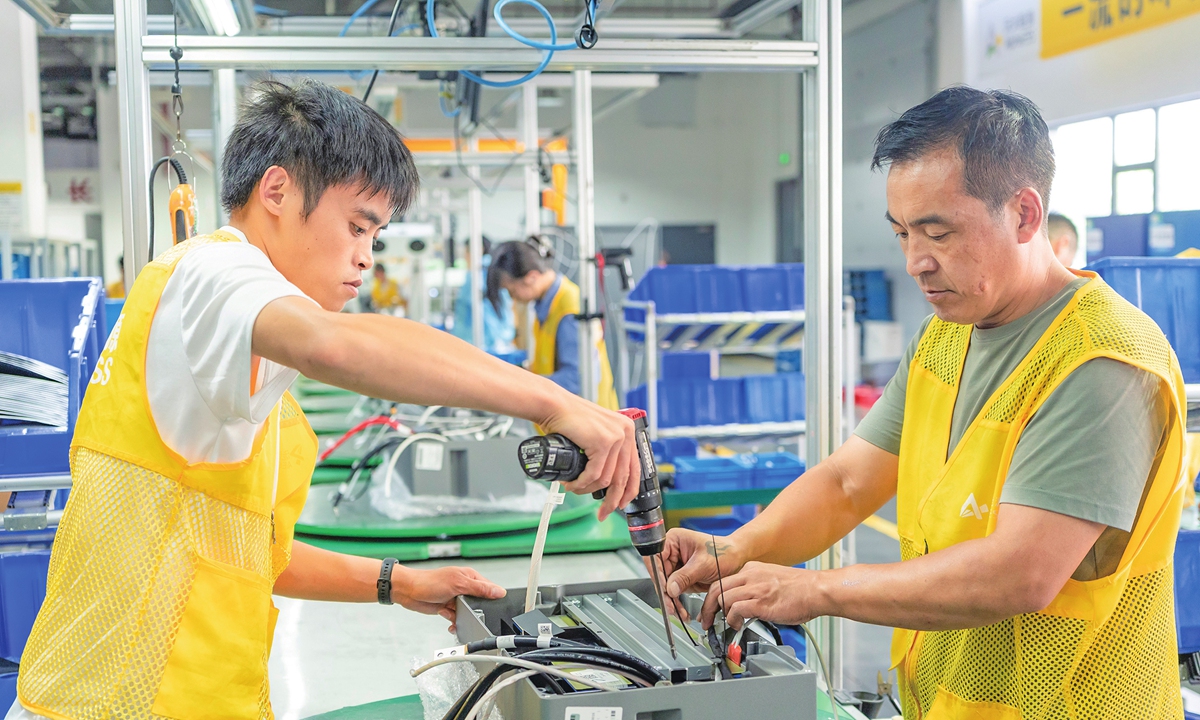 Workers produce energy storage products for export at a workshop in Nantong, East China's Jiangsu Province, on September 8, 2026. Customs data showed China's goods trade reached 34.78 trillion yuan ($5.18 trillion) in the first eight months of 2026, up 17.6 percent year-on-year, with exports rising 14.6 percent to 20.17 trillion yuan. Photo: VCG