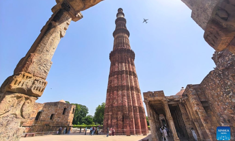 This photo taken with a mobile phone shows people visiting Qutb Minar in New Delhi, India, Sept. 9, 2026. The Qutb Minar, or Qutab Minar, was originally built in the 12th century and was inscribed on the World Heritage List by the United Nations Educational, Scientific and Cultural Organization (UNESCO) in 1993. India is a country with a long-standing civilization. Its capital, New Delhi, located on the banks of the Yamuna River, serves as the country's political and cultural center. (Xinhua/Yan Yan)