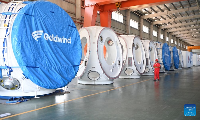 A staff member registers products at a wind power equipment manufacturing enterprise in Qinzhou, south China's Guangxi Zhuang Autonomous Region, Sept. 3, 2026. The company's products are also sold to overseas markets.(Xinhua/Cao Yiming)