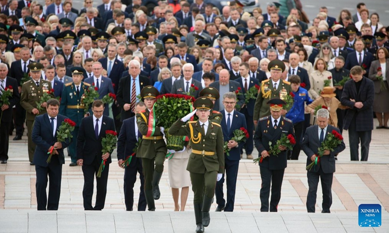 People lay flowers at the Minsk Hero City Obelisk in Minsk, Belarus, Sept. 12, 2026. A series of events were held in Minsk on Saturday to celebrate the 959th anniversary of the founding of the city. (Xinhua/Henadz Zhinkov)