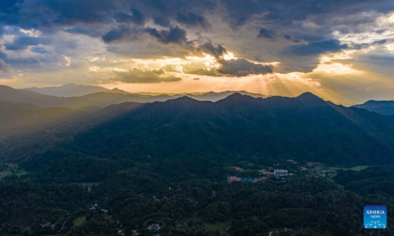 A drone photo taken on Sept. 10, 2026 shows a view of the Wuzhishan section of the Hainan Tropical Rainforest National Park in south China's Hainan Province. The scenic ring road surrounding the Hainan Tropical Rainforest National Park passes through nine cities and counties in Hainan, including Lingshui, Baoting, Ledong and Changjiang, with a total length of 466 kilometers. The ring road was officially opened to traffic in December 2024.
This road connects the beautiful scenery of the mountainous areas in the central and southern parts of Hainan Island and builds a green corridor that balances ecological protection and cultural tourism development.
At present, many tourists come to cycle and drive on the road, boosting tourism-related consumption including accommodation, catering, specialty agricultural products, and outdoor culture and tourism along the road. Photo: Xinhua