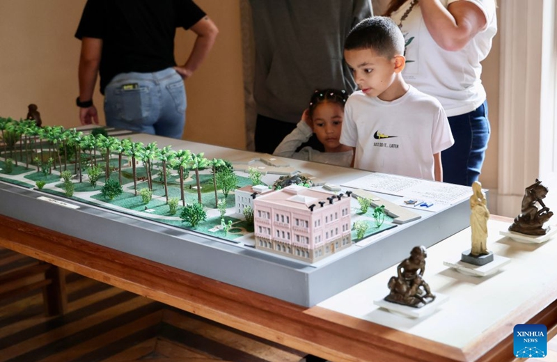 Children look at the sand table model of Catete Palace at the Museum of the Republic in Rio de Janeiro, Brazil, Sept. 12, 2026. The Museum of the Republic is housed in Catete Palace in Rio de Janeiro, which served as Brazil's presidential palace from 1897 to 1960. (Xinhua/Jin Haoyuan)