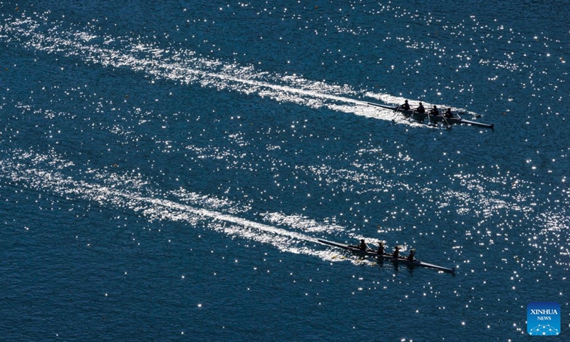 Boats race on Lake Bled during the 2026 World Rowing Masters Regatta Bled in Bled, Slovenia, Sept. 12, 2026. (Photo by Zeljko Stevanic/Xinhua)